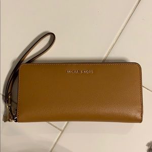 Authentic Michael Kors tan Wristlet/wallet